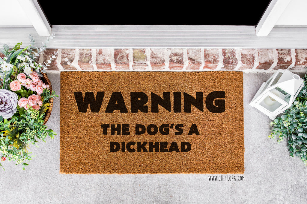 The Dog's A Dickhead Doormat
